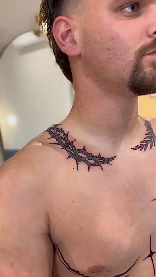 Chest tattoo with lettering